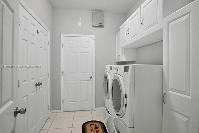 5806 Nw Breezy Brook Ct, House other with 3 bedrooms, 2 bathrooms and null parking in Port St. Lucie FL | Image 26