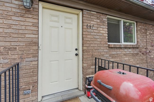 Property entrance with brick siding | Image 33