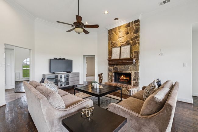 Looking towards the front of the home in the living room | Image 10