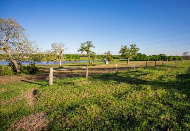 View of yard with a water view | Image 27