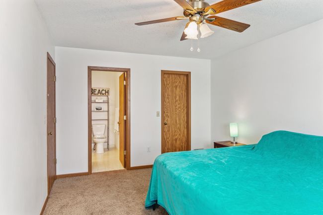 Primary bedroom with large walk-in closet and walk through bathroom | Image 12