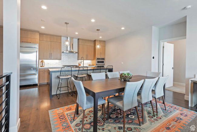 Dining room featuring recessed lighting, dark wood finished floors, and baseboards | Image 12