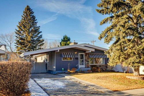409 Woodland Cres Se, Calgary, AB, T2J1J7 | Card Image