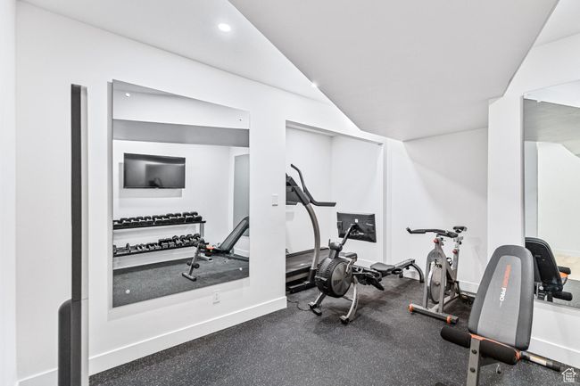 Workout area with recessed lighting and baseboards | Image 32