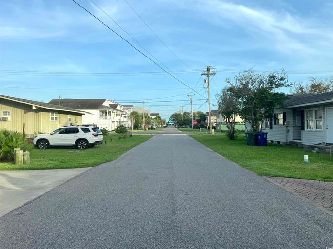 View of asphalt street with a residential view | Image 32