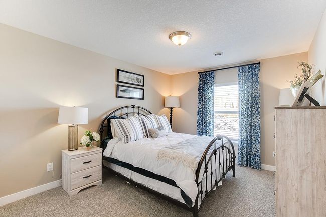 Lower level guest bedroom making this a 4 bedroom house. | Image 14