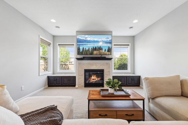Even comes with these gorgeous built-ins & a cozy, tile gas-fireplace | Image 23