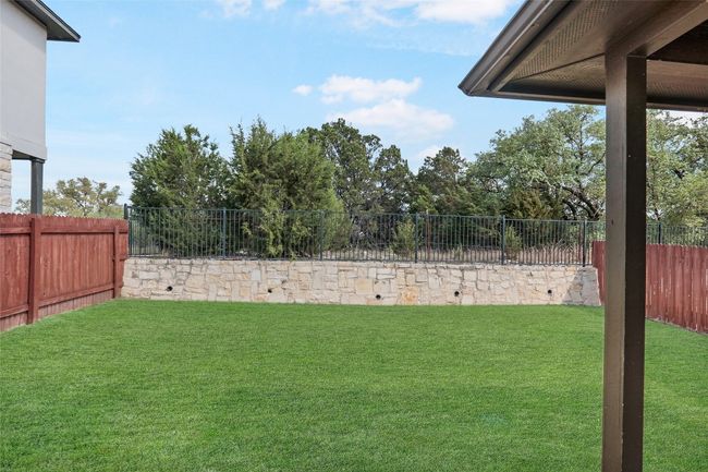 View of yard featuring a fenced backyard | Image 27