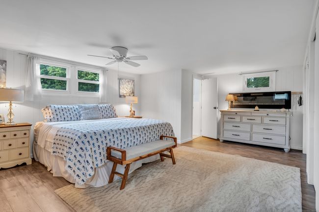 Spacious Bedroom with Electric Fireplace | Image 5