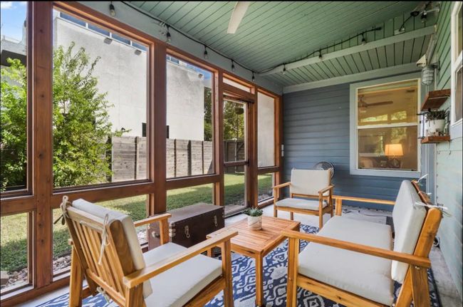 Sunroom featuring track lighting, healthy amount of natural light, and an outdoor living space | Image 21