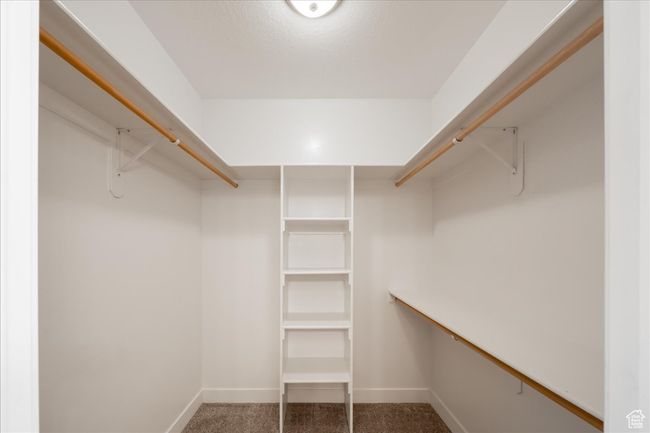 Walk in closet with carpet | Image 24