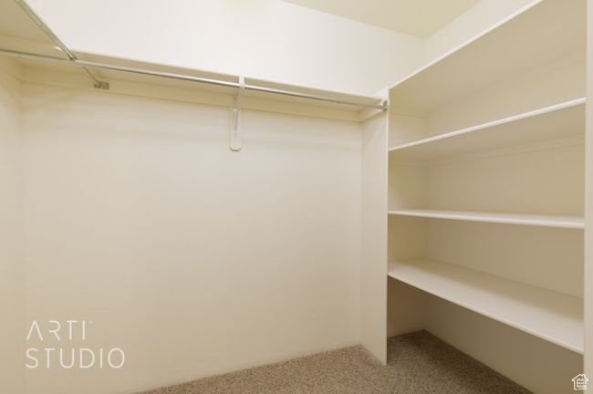 Walk in closet with carpet | Image 39