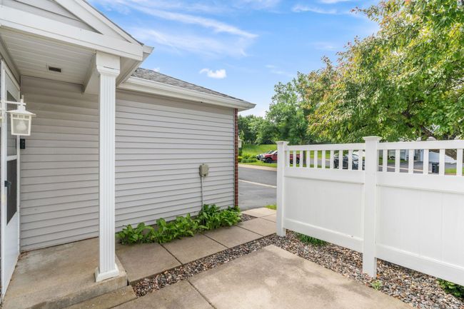 Your private outdoor space offers easy access to the front walkway and driveway. | Image 5