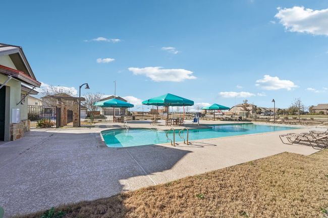 Pool featuring a patio and fence | Image 27