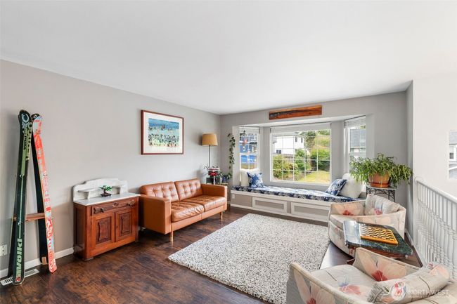 Upstairs living space with built-in window seat. | Image 5