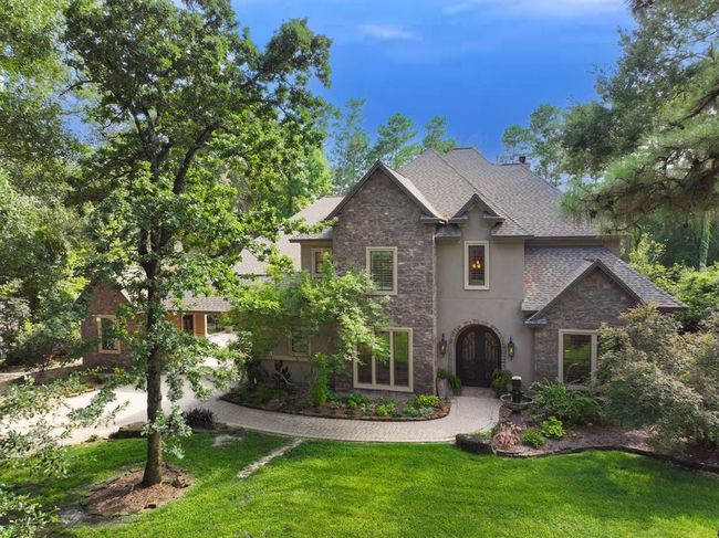 The quiet setting among tall trees provides a serene setting. | Image 5