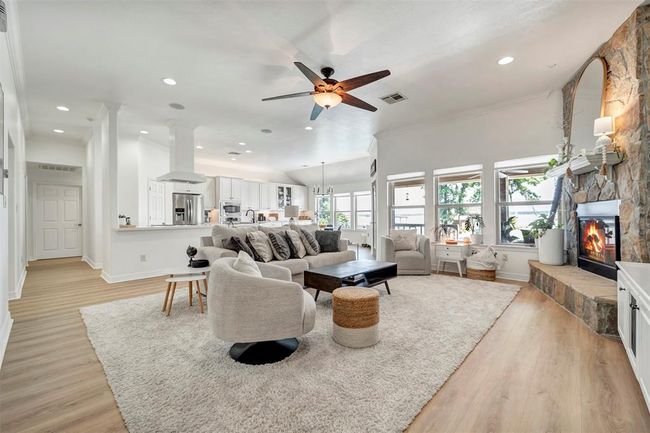 Spacious open-concept living area designed for large gatherings and effortless entertaining—perfect for all your special occasions | Image 11
