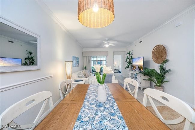 Dining room is open to the main living area | Image 10