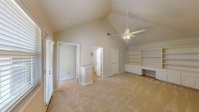Bedroom 4 - vaulted ceiling, built-in cabinets & desk | Image 35