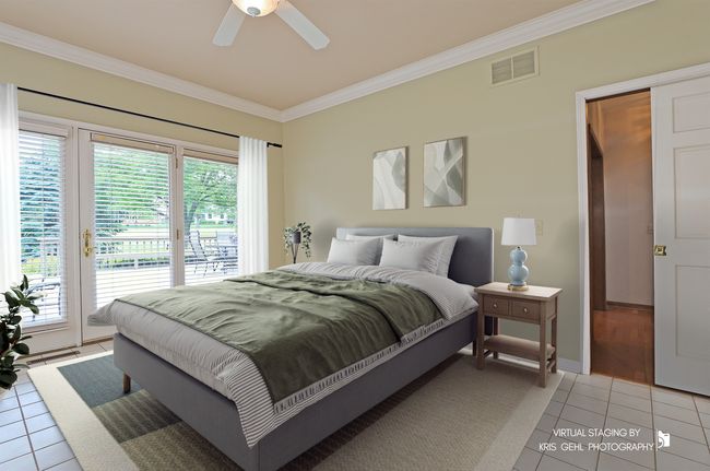 Main Level Bedroom with two closets and French doo | Image 8