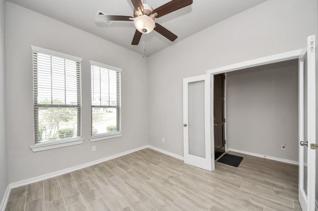 Bright home office with French doors – perfect for working from home or study space. | Image 11