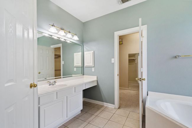 Sink #1 with a built-in vanity and extra storage space for your nightly skin care routine! | Image 25