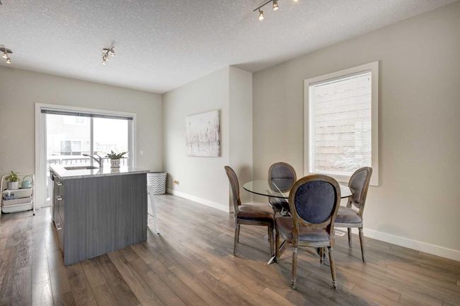 107 - 2802 Kings Heights Gate Se, Home with 3 bedrooms, 2 bathrooms and 2 parking in Airdrie AB | Image 7