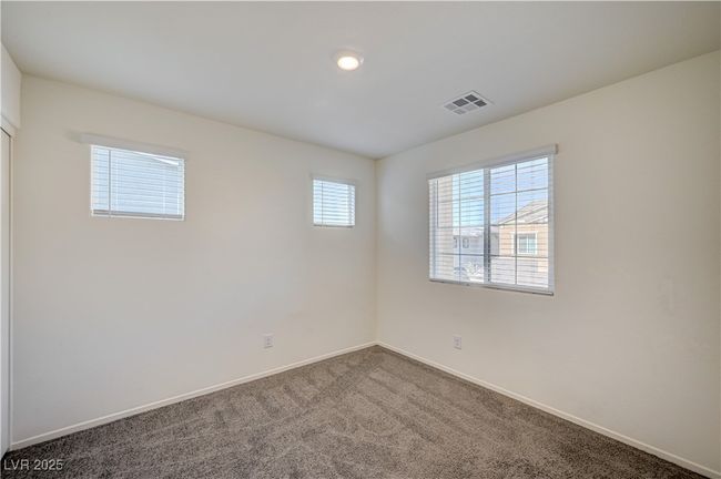 Unfurnished room with carpet floors and baseboards | Image 20