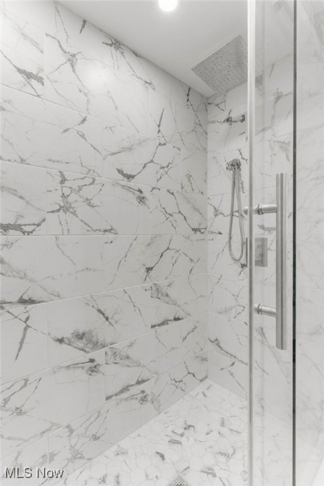 Full bathroom featuring a marble finish shower | Image 23