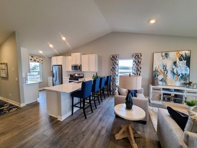 This functional kitchen boasts 42' cabinets with hardware, stainless steel appliances and quartz countertops. Photo is of actual home. Colors and options may vary. Ask Sales Agent for details. | Image 3