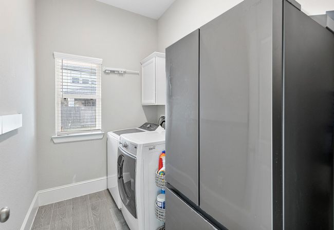 An efficient utility room designed with modern appliances, abundant storage, and plenty of natural light—making everyday tasks a breeze. | Image 41