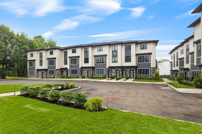 View of property with uncovered parking | Image 9