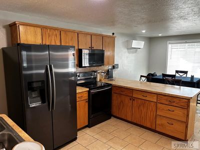 1020 Ada Avenue, Home with 4 bedrooms, 3 bathrooms and null parking in Idaho Falls ID | Image 3