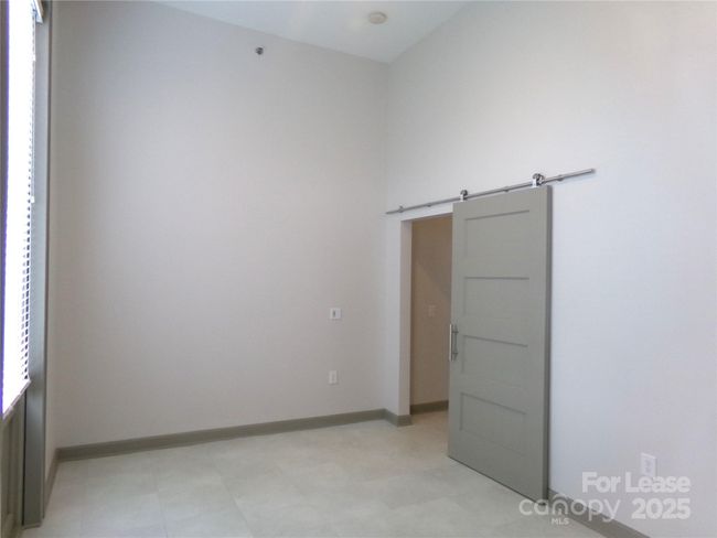This spacious room will make a great primary bedroom | Image 19
