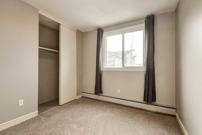 307 - 2512 1 Avenue Nw, Home with 2 bedrooms, 1 bathrooms and 1 parking in Calgary AB | Image 22