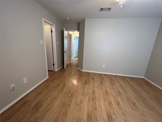 Primary bedroom looking towards hall and other bedrooms | Image 34
