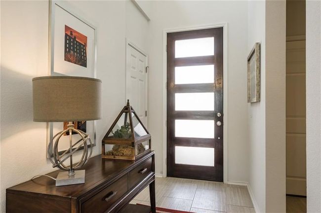 Entryway with wood finished floors and baseboards | Image 4