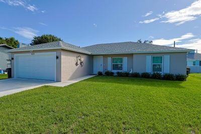 6106 Bamboo Drive, House other with 3 bedrooms, 2 bathrooms and null parking in Fort Pierce FL | Image 2