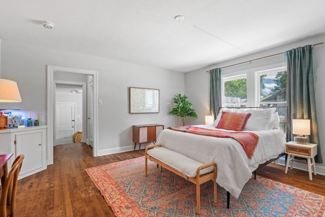 View of bedroom into closet area and third bedroom/flex space. | Image 11