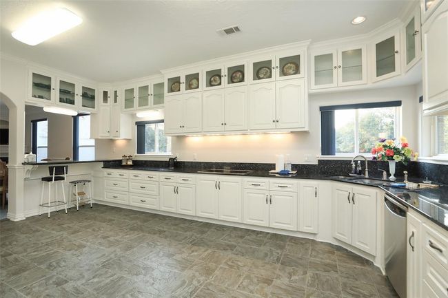 Plenty glass fronted cabinets to display your dishes. Look at all these cabinets for storage!! | Image 19