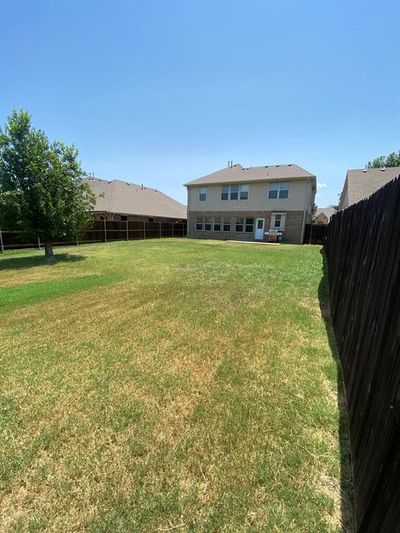 HUGE backyard backing to greenbelt and adjacent to pond | Image 2