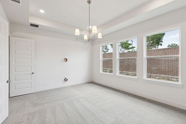The dreamy owner's suite is located at the rear of the home for additional privacy. | Image 12