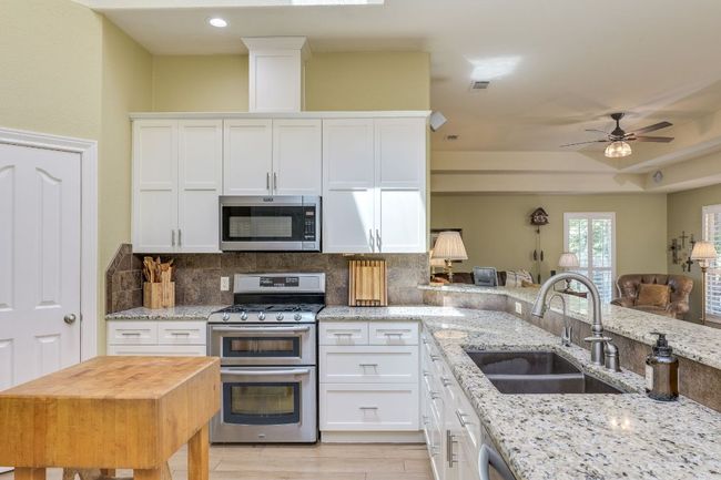 New cabinet faces in this light and bright kitchen, with a skylight. | Image 18