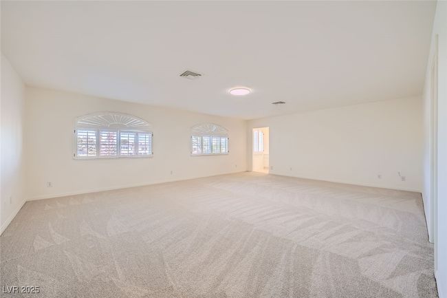 Spare room with light carpet, baseboards, and visible vents | Image 46
