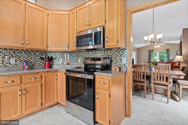 New stove and microwave. Cabinets with pull out drawers. | Image 5