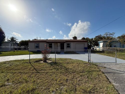 0-1011 Avenue F, Riviera Beach, FL, 33404-7529 | Card Image