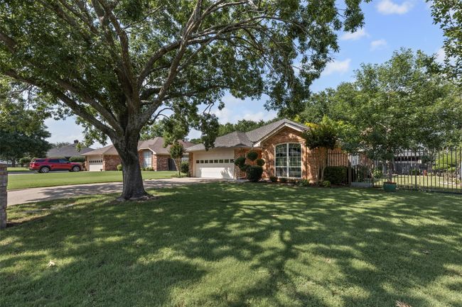 Discover this beautifully maintained 3-bedroom, 2-bath residence nestled in the highly sought after Winchester Addition with new roof and new gutters. | Image 25