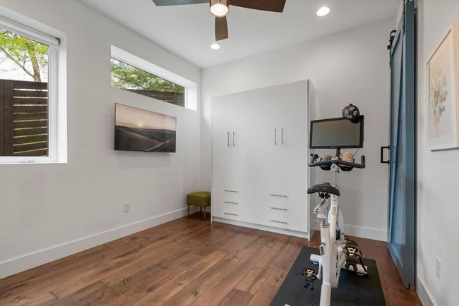The 4th bedroom also works wells for a home gym. Murphy bed conveys. | Image 32