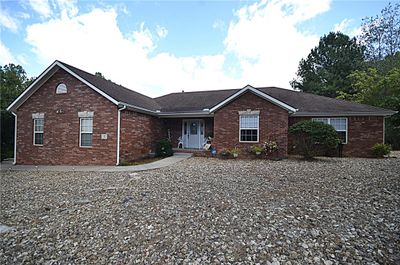 2 Granshire Lane, Bella Vista, Arkansas, 72714. Notice the level, maintenance free front yard. | Image 1