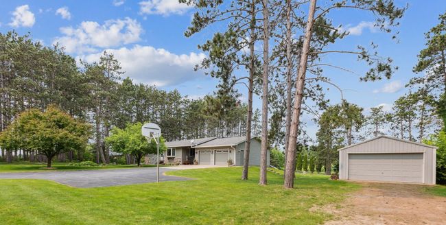 Great variety of trees, lush lawn and space to roam and play. | Image 5